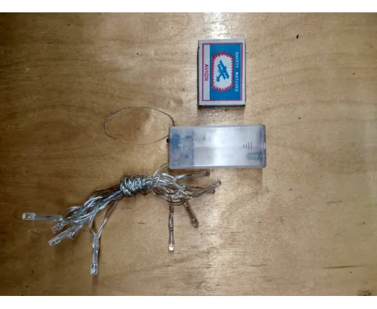 Гирлянда Feron CL301 линейная (0.64w, 4000K, батарейки 2*АА, 0,9м + 0.5м прозрачный шнур) арт. 26736