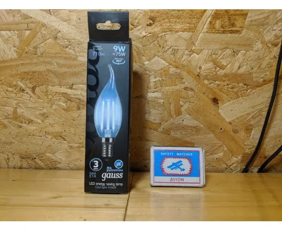 Gauss LED Filament Свеча на ветру E14 9W 710lm 4100K 1/10/50 арт.104801209 Упаковка